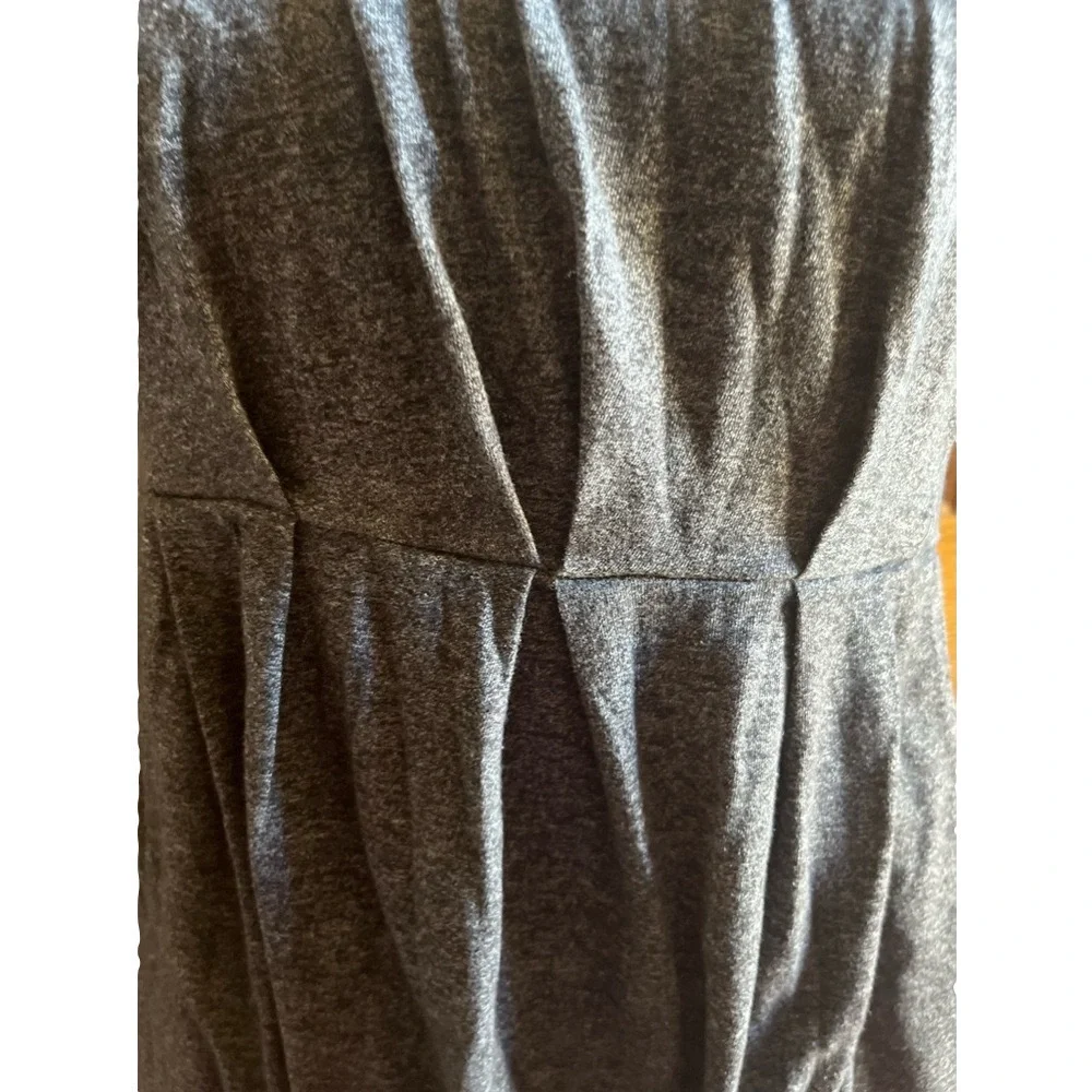 Gray 1 piece shirt dress. Has pockets and pleats, mini length. Size M